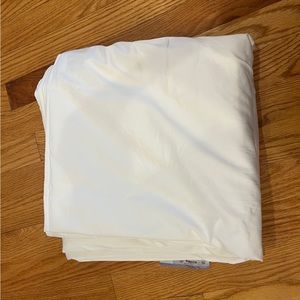 New king  white flat sheet. Was part of a split king set. Cotton and viscose.